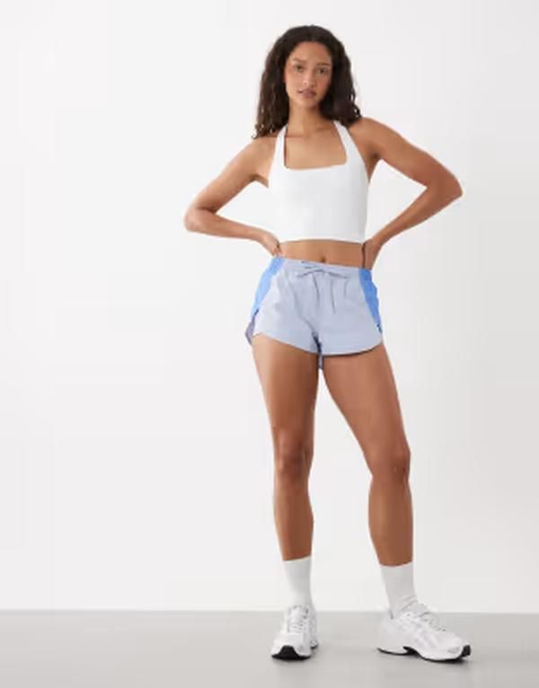 コットンオン レディース ボトムス ハーフパンツ・ショーツ ショートパンツ Cotton Active dolphin hem shorts in violet blue ブルー