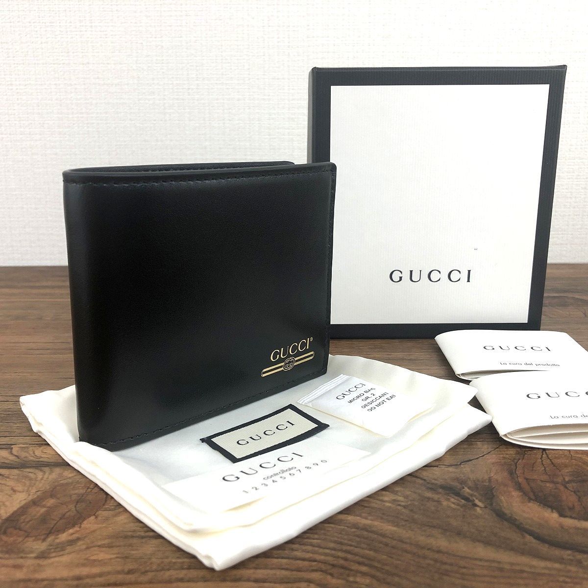 486 送料込み！ 未使用品 GUCCI 二つ折り札入れ 547385 ブラック プレゼントにも！