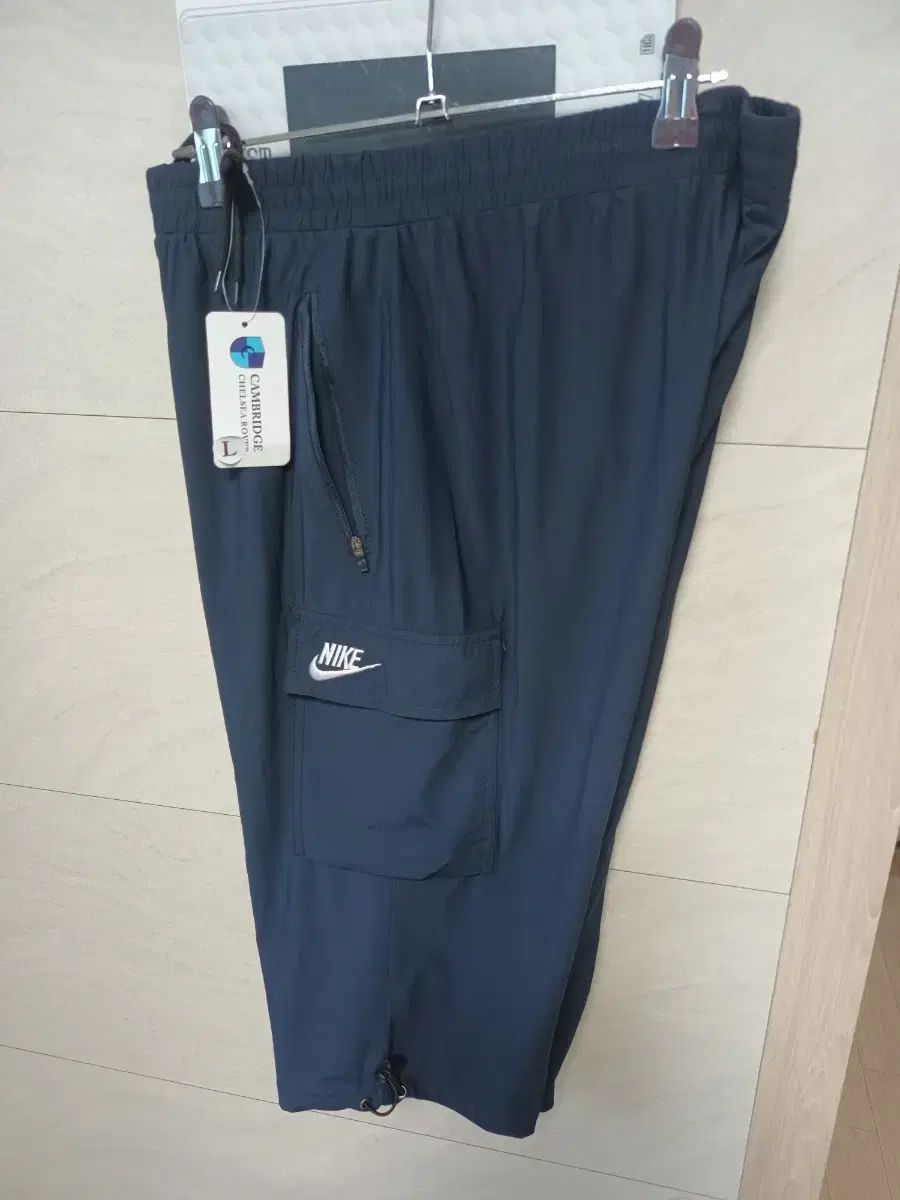ナイキ ネイビーカーゴ型 7分パンツ L 群青色 新品