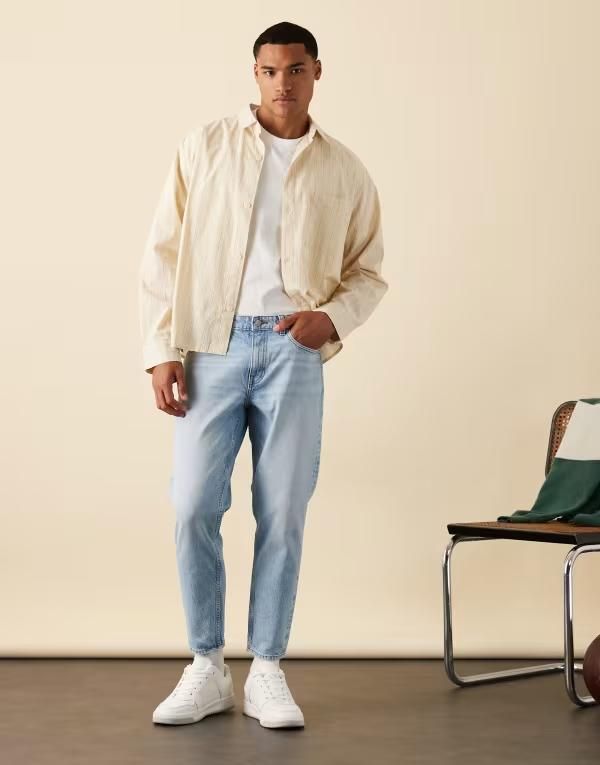 エイソス メンズ ボトムス デニムパンツ ジーンズ ASOS DESIGN tapered jeans in mid wash Mid wash blue ブルー