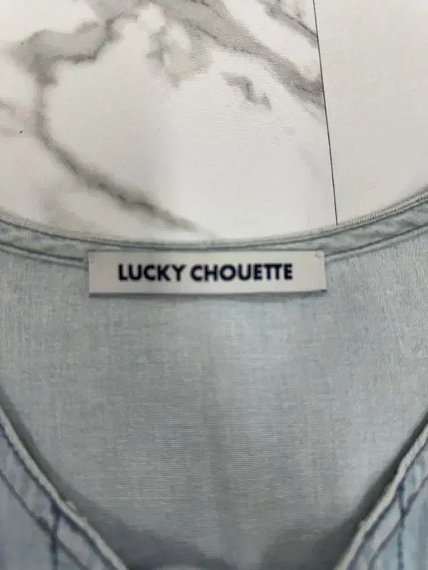 LUCKY CHOUETTE ラッキーシュエトゥ ライトブルー デニム ONE PIECE LUCKY CHOUETTE ラッキーシュエトゥ ライトブルー デニム ONE PIECE