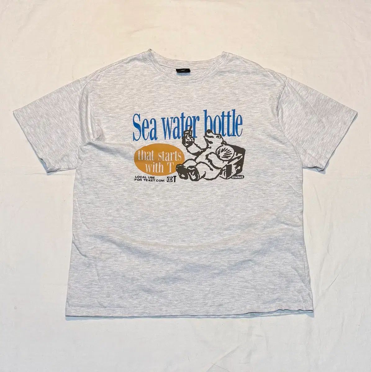 テケット クマ グラフィック 半袖 Tシャツ メランジ グレー