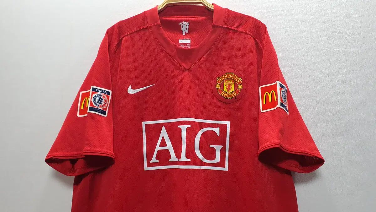 07 08 MANCHESTER UNITED FC HOME ウェイン・ルーニ UNI 105サイズ (横57 縦74)