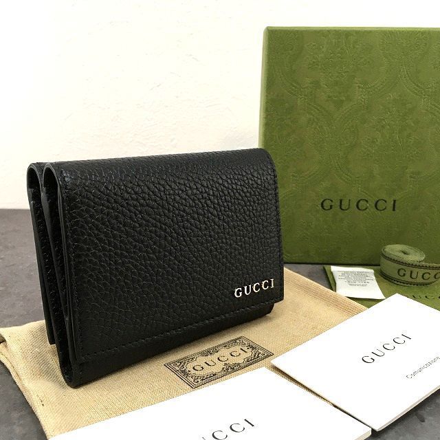 261 送料込み！ 未使用品 GUCCI コンパクトウォレット 771210 スクリプト Wホック財布 箱付き