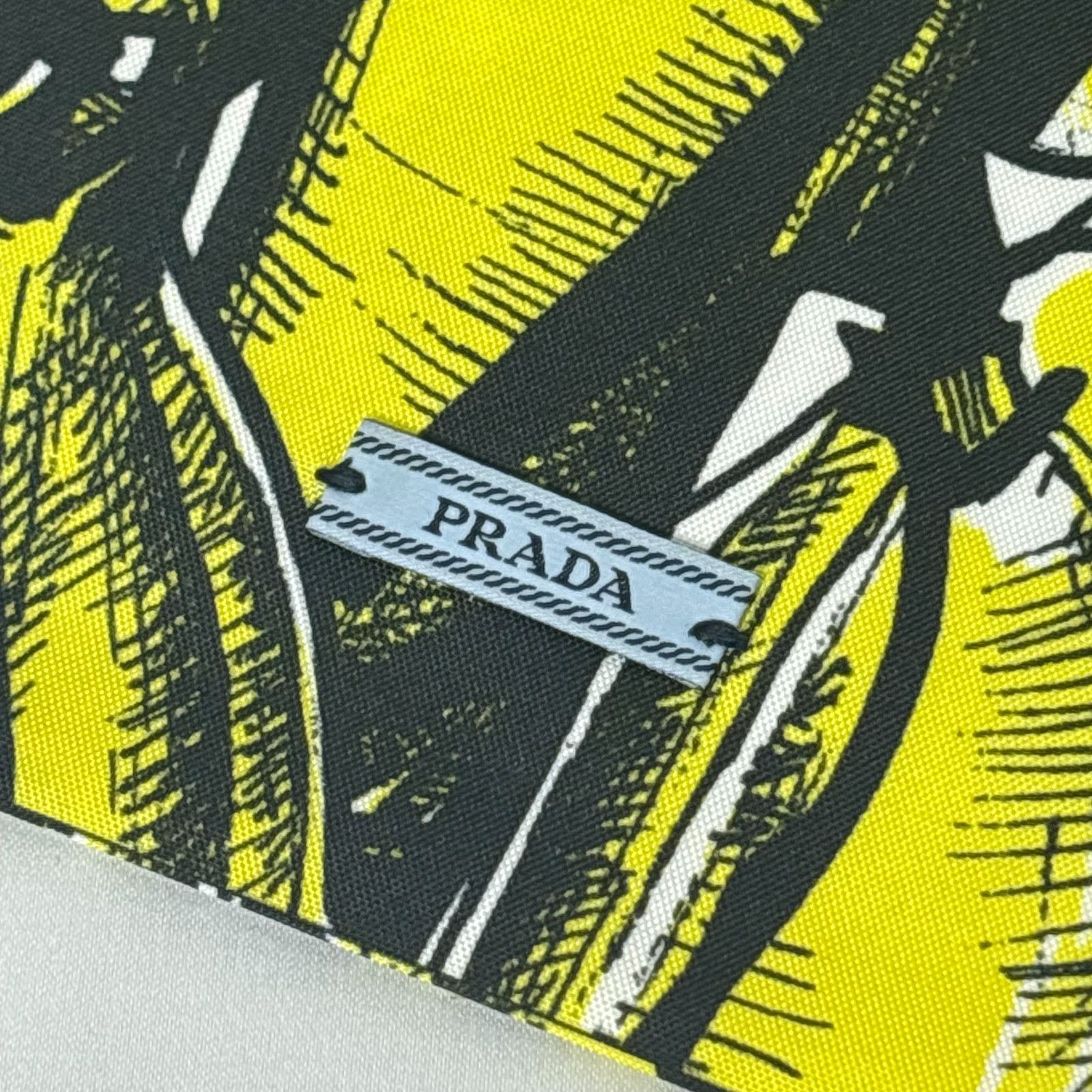 PRADA プラダ バナナ柄 巾着 ポーチ 黄色 黒 - メルカリ