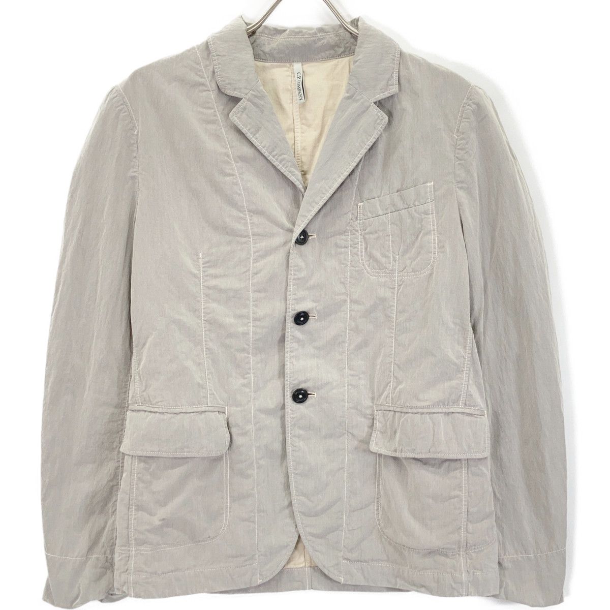 C.P.COMPANY シーピーカンパニー 14WCPUZ01437 ベージュ コットン 