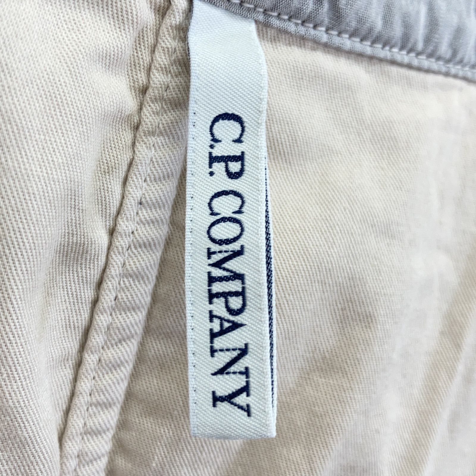 C.P.COMPANY シーピーカンパニー 14WCPUZ01437 ベージュ コットン 