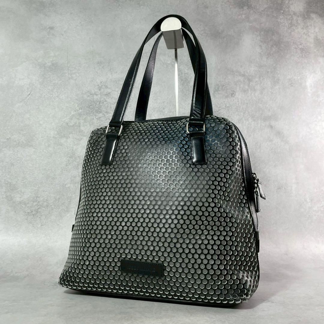 ISSEY MIYAKE hand bag punching leather