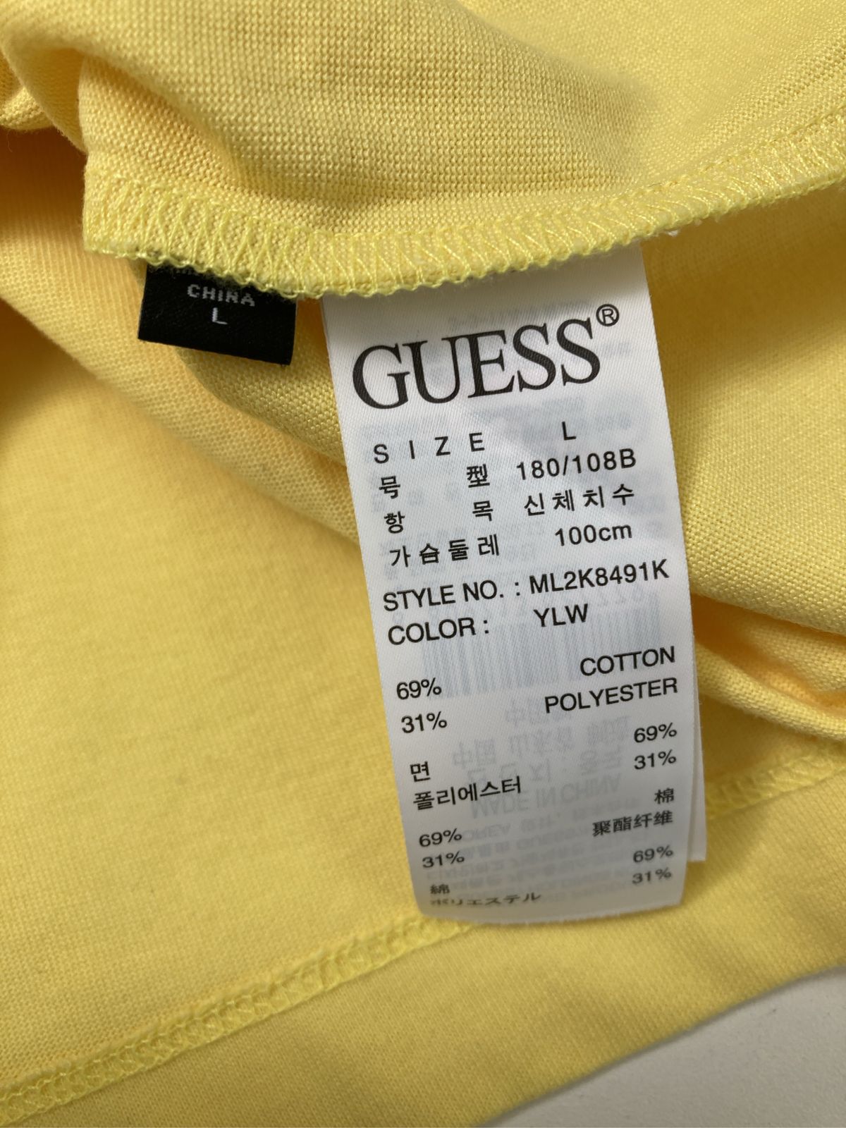 GUESS ゲス Tシャツ/カットソー L イエロー 無地 ワンポイント ブランドロゴ ミドル丈 半袖 クルーネック(丸首) メンズ レディース
