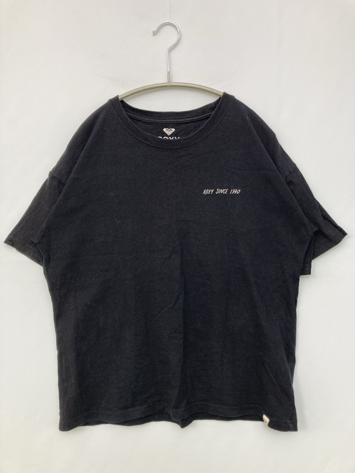 ROXY ロキシー Tシャツ/カットソー M ブラック 前面プリント バックプリント ワンポイント ブランドロゴ ミドル丈 半袖 クルーネック(丸首) レディース
