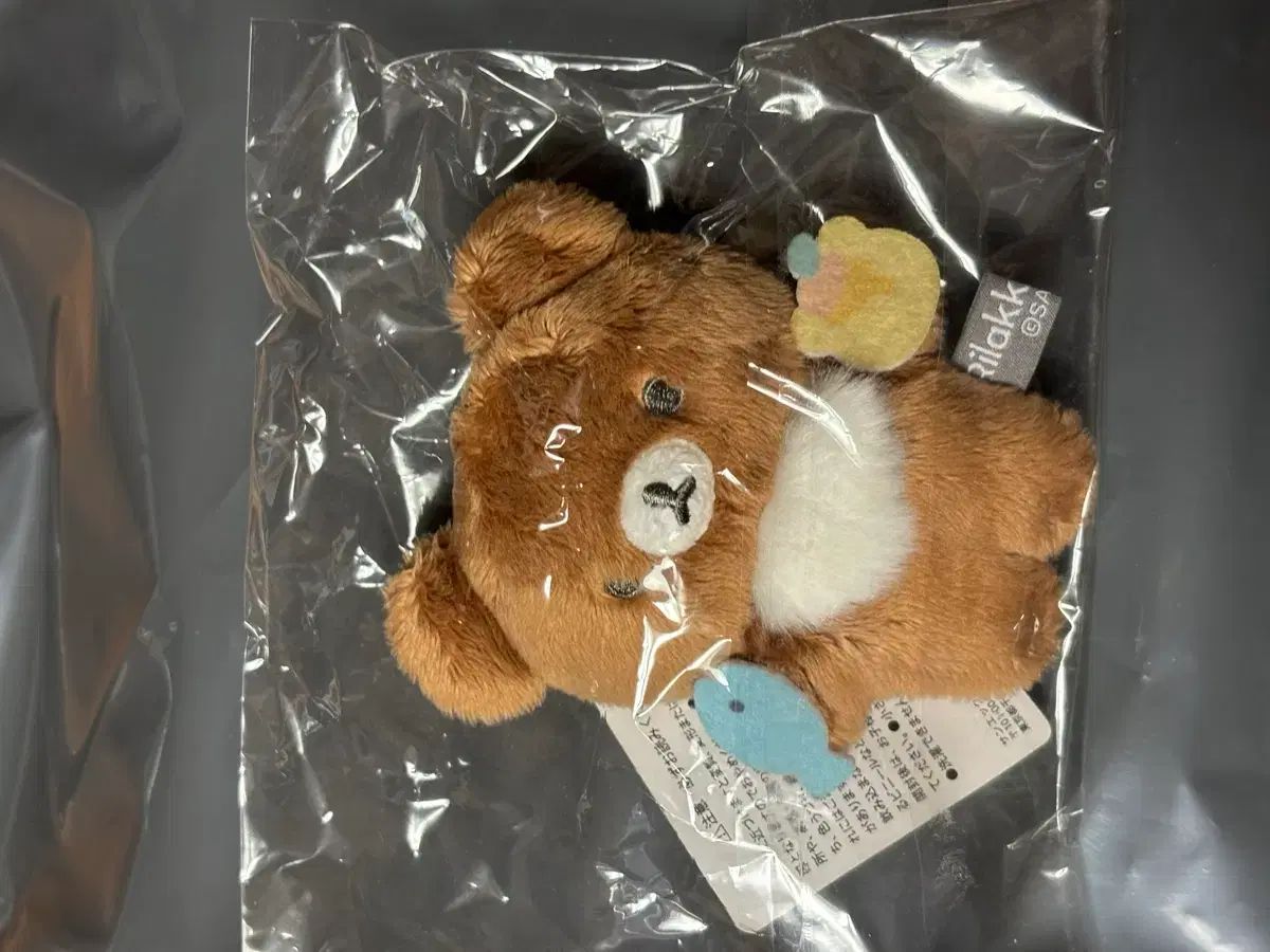 コリラックマチャイロイコグマぬいぐるみ木