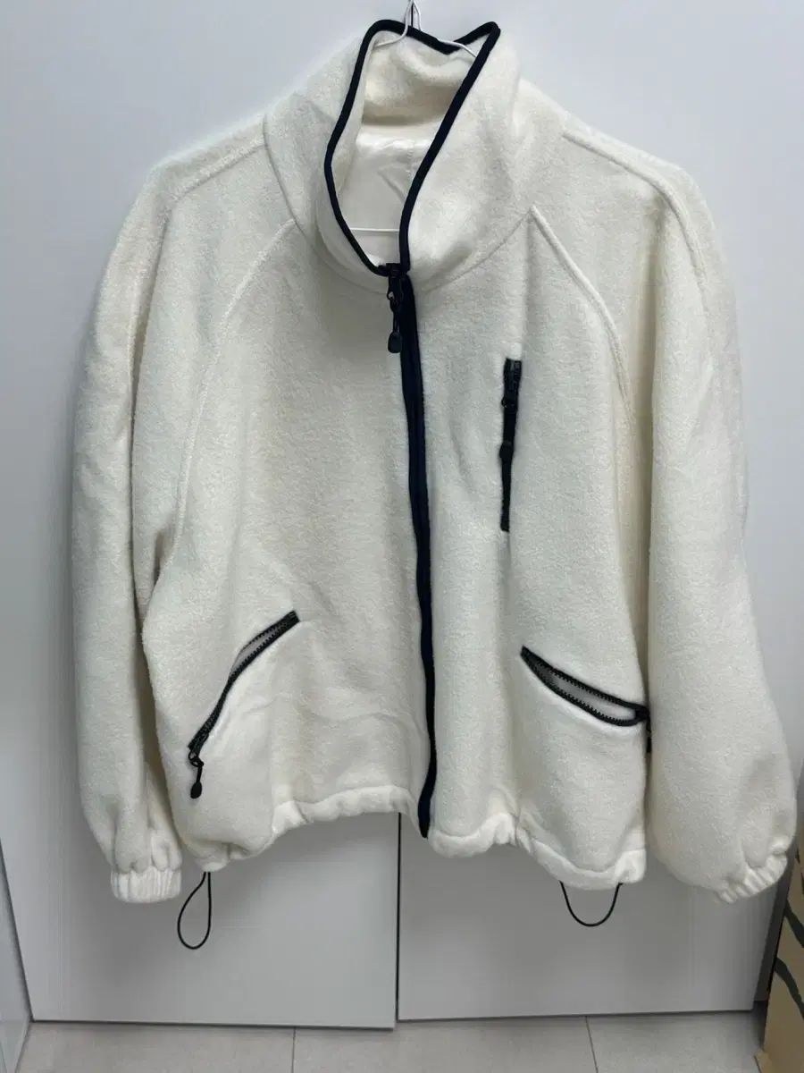 セリーアンドリオン キトン フリース ジップアップ アイボリー