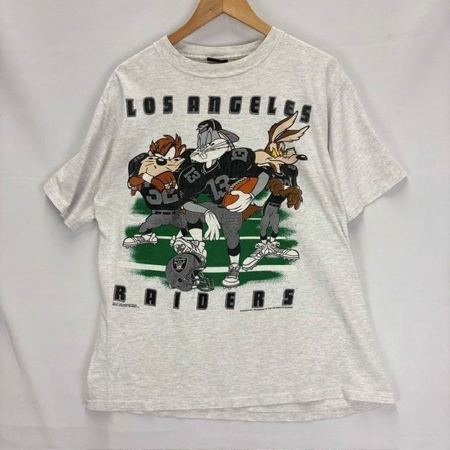 90年代 NFL LA RAIDERS Warner Bros MNFG Changes, Queens, NY BIG プリント イラスト Ｔシャツ サイズXL 08052205 01