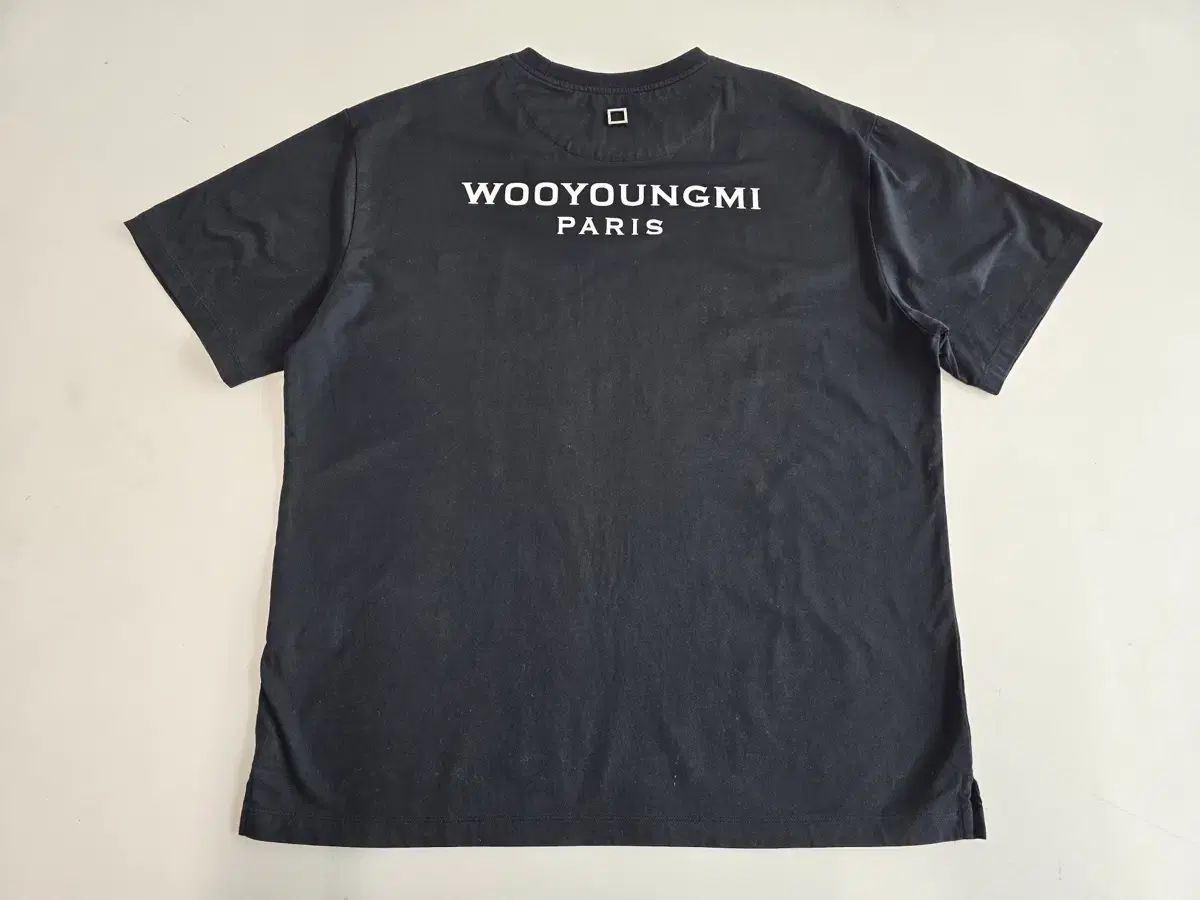 ウーヨンミーWOOYOUNGMI paris パリ ブラックTシャツ半袖夏 WOOYOUNGMI ウーヨンミ パリ パリス バックロゴ 半袖Tシャツ ブラック
