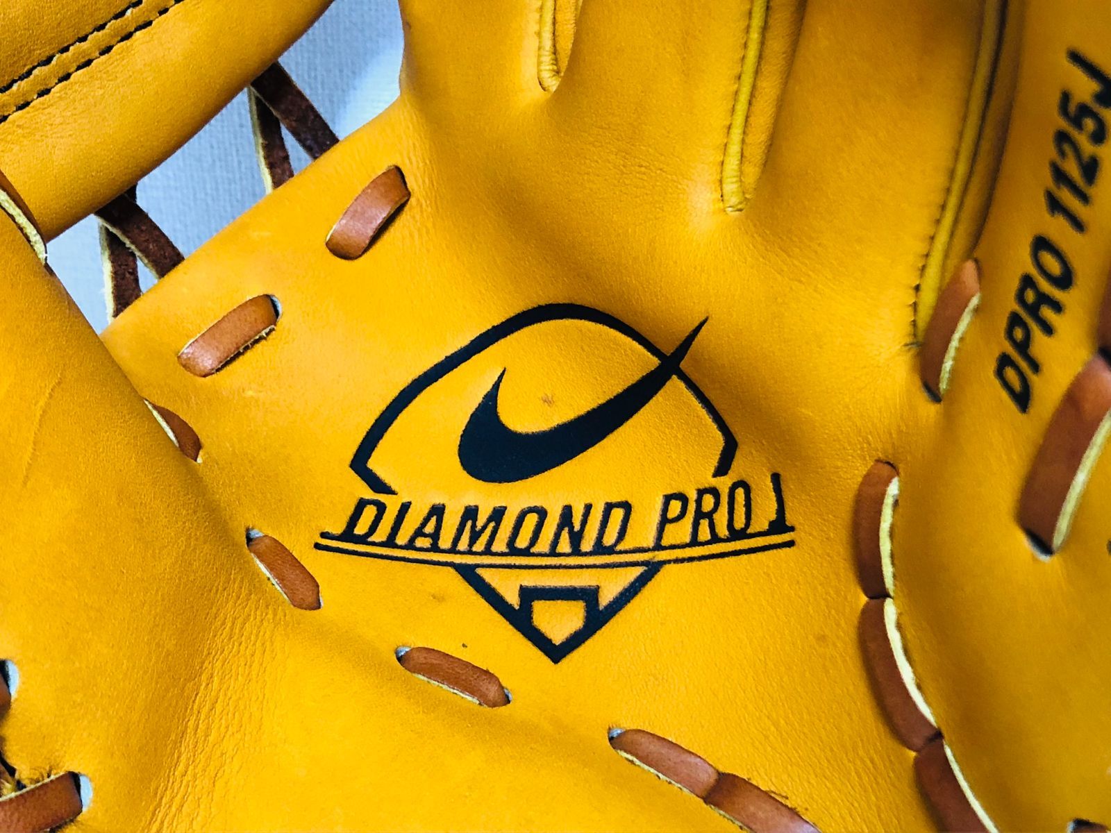 ロゴタグ付き NIKE ナイキ DIAMOND PRO J 1125J 軟式 内野手用