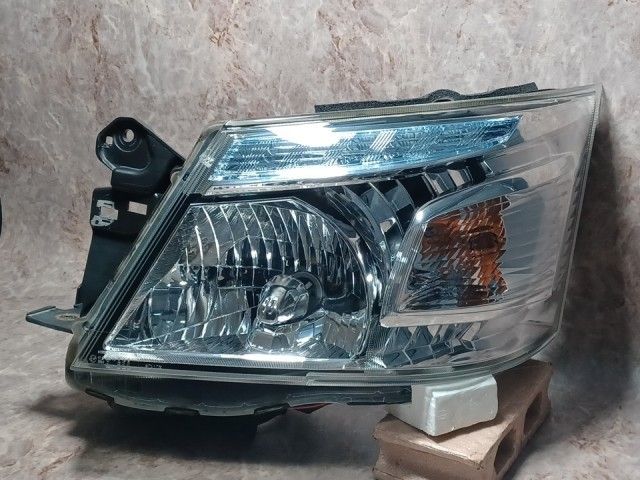 コーティング済 NV350キャラバン VW6E26 左ヘッドランプ・ヘッドライト