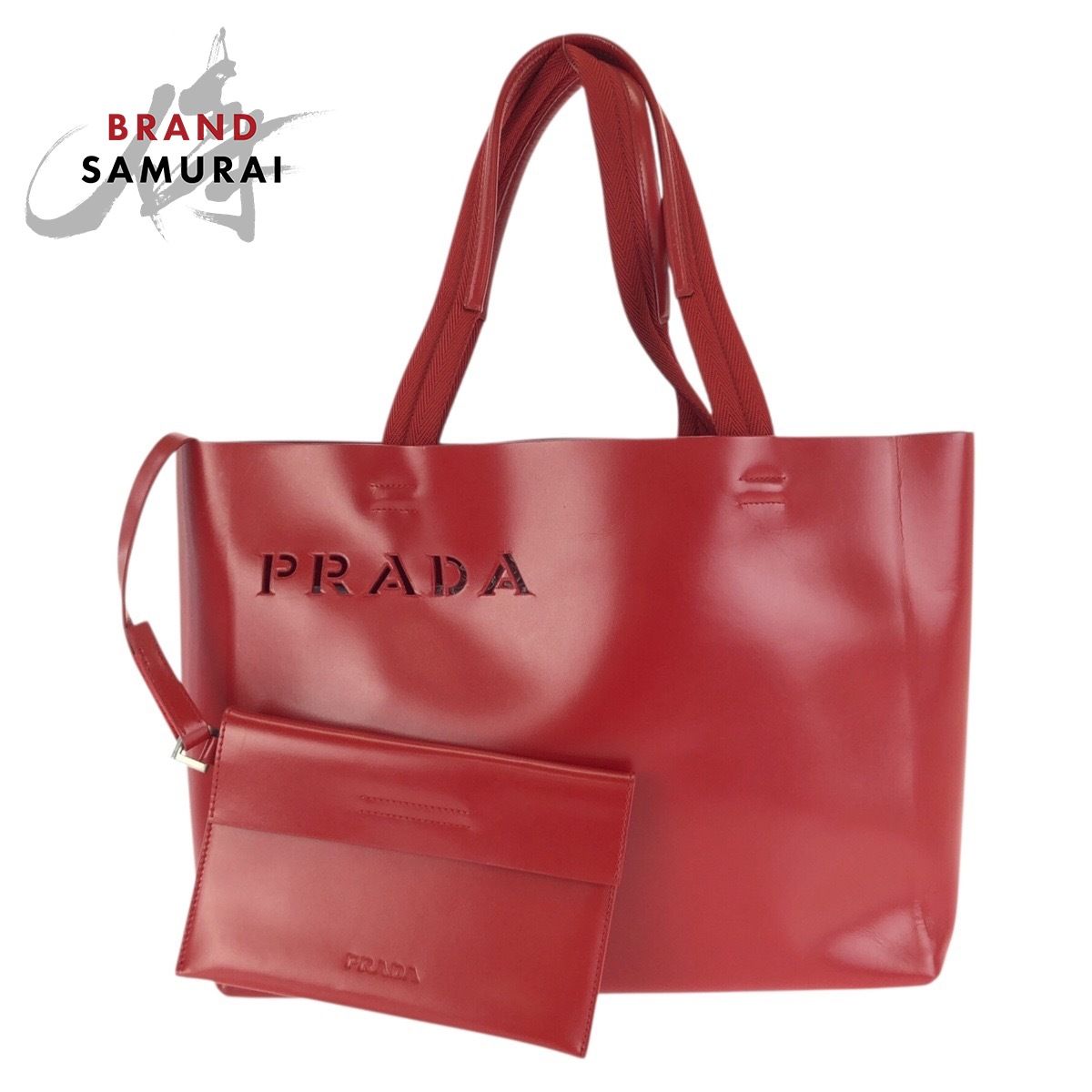PRADA レッド トートバッグ　プラダ　レザー 美品 PRADA プラダ ロゴ型抜き レッド シルバー金具 レザー トート