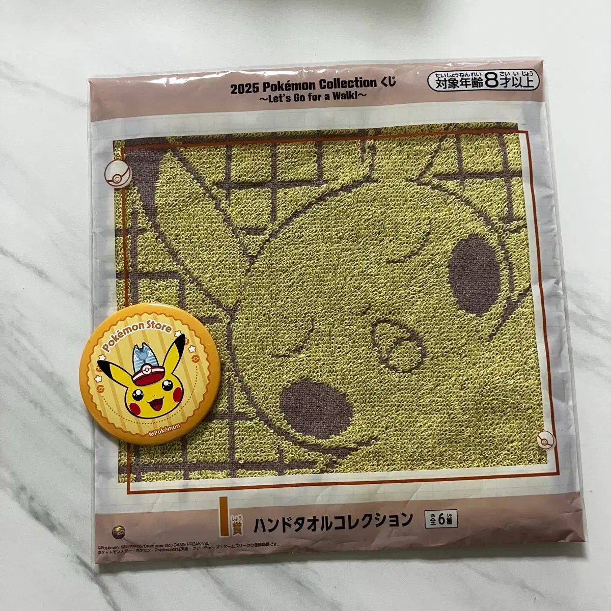 ポケモン 2025 ハンドタオル ポケモン 2025 ハンドタオル + ピカチュウ バッジ (新 サンドダンス