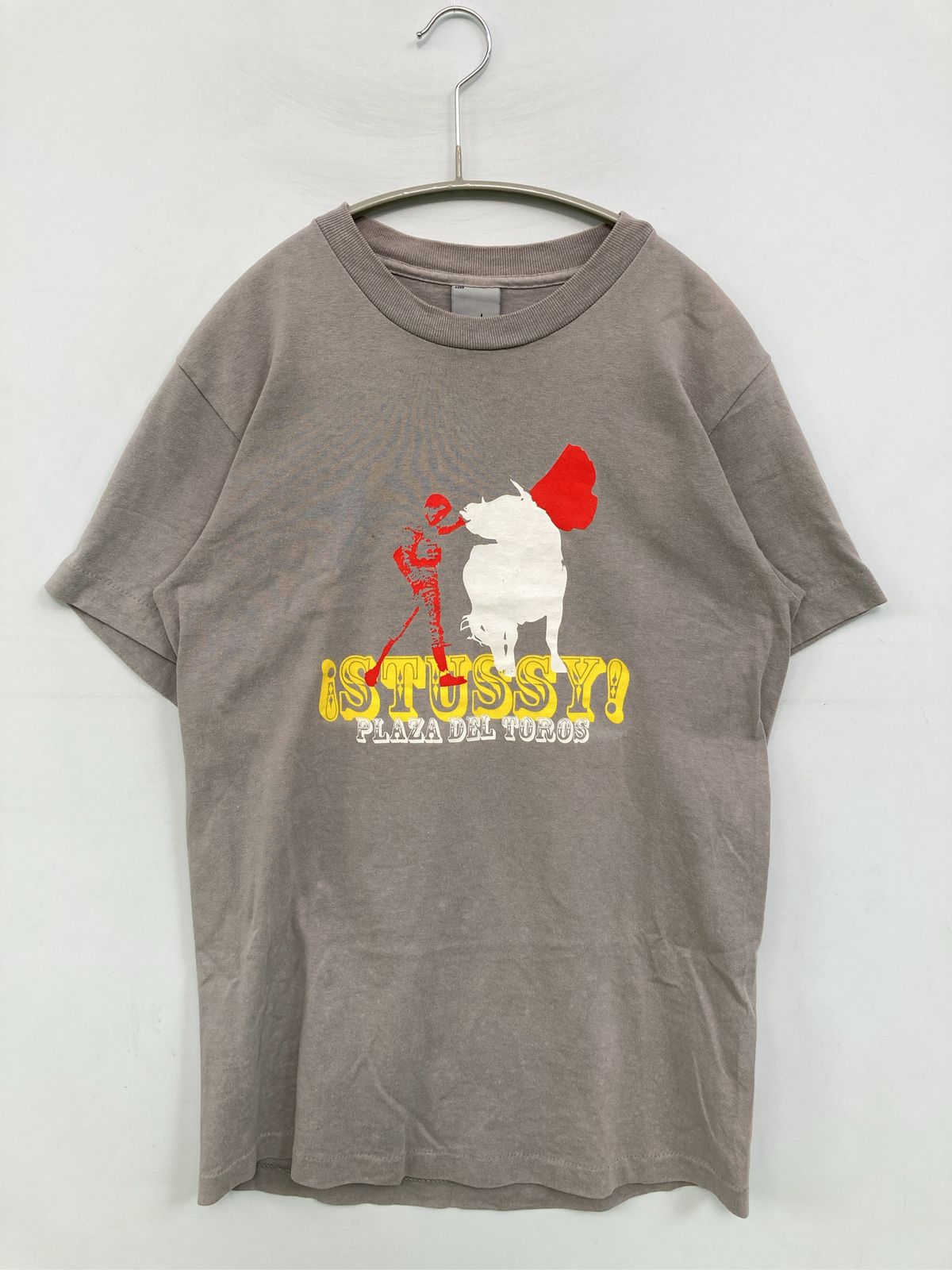 stussy ステューシー Tシャツ/カットソー SMALL ブラウン 前面プリント バックプリント ブランドロゴ ミドル丈 半袖 クルーネック(丸首) メンズ レディース