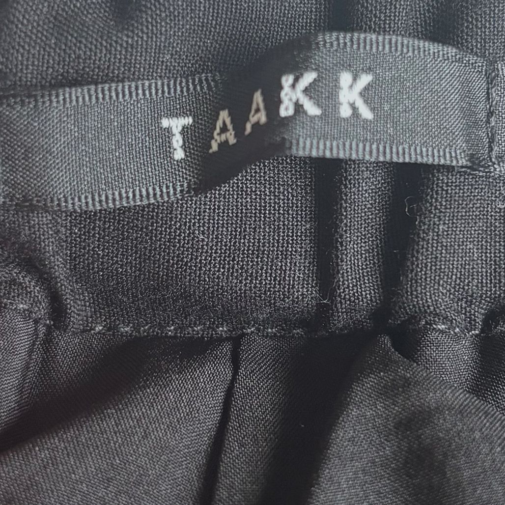 taakk ターク 2024-2025AW アシンメトリーフリルスラックス - メルカリ