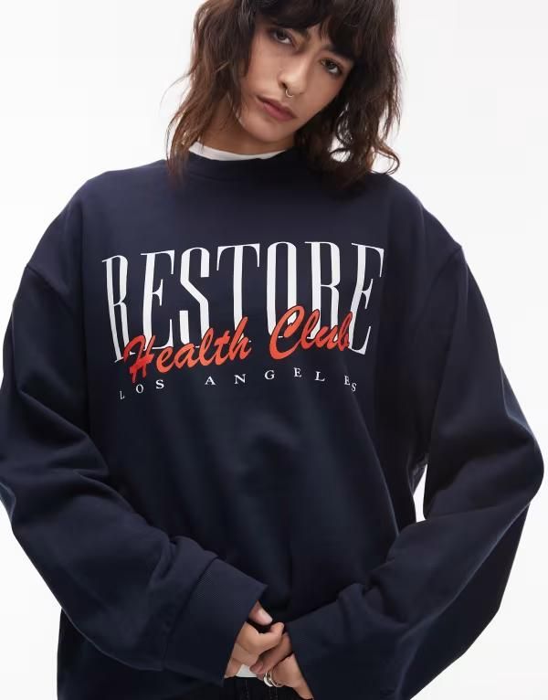 エイソス レディース アウター パーカー・スウェット スウェット シャツ グラフィック ASOS DESIGN oversized sweatshirt with restore health club graphic NAVY ネイビー