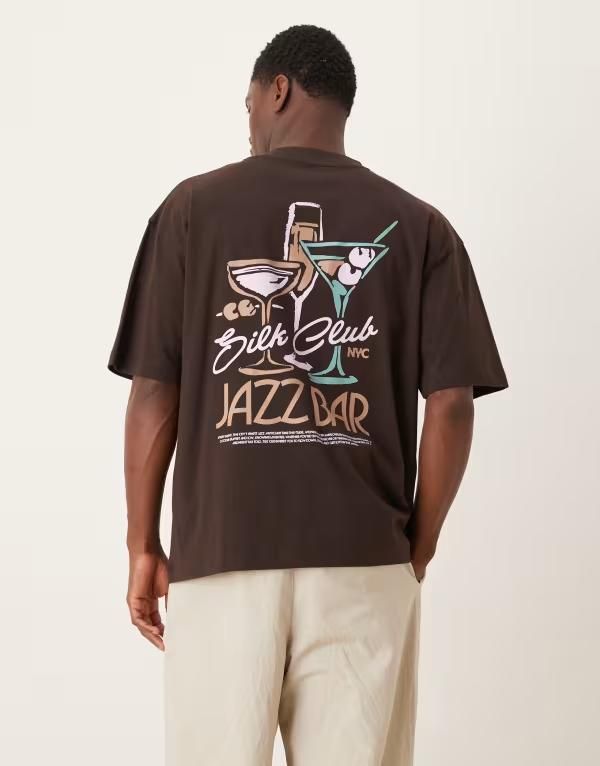 エイソス メンズ トップス Tシャツ グラフィック ASOS DESIGN oversized Tshirt with jazz bar graphic Mole ブラウン