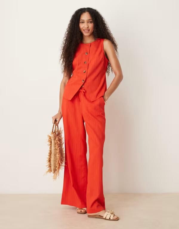 エイソス レディース ボトムス カジュアルパンツ パンツ ASOS DESIGN crinkle palazzo pants in orange part of a set Orange オレンジ