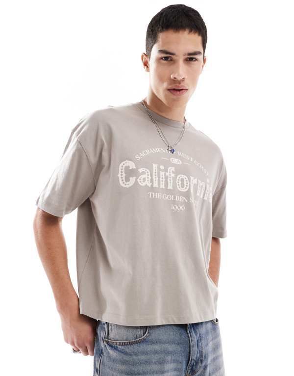 エイソス メンズ トップス Tシャツ グラフィック ASOS DESIGN boxy oversized tshirt with city graphic Driftwood ブラウン