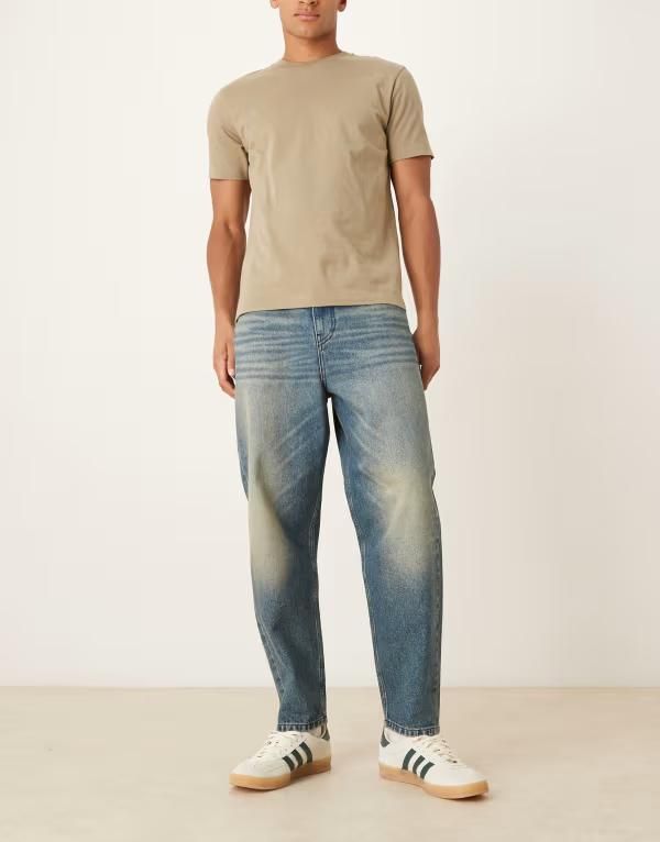 エイソス メンズ ボトムス デニムパンツ ジーンズ ASOS DESIGN relaxed tapered jeans in dark wash blue with tint Dark wash blue ブルー