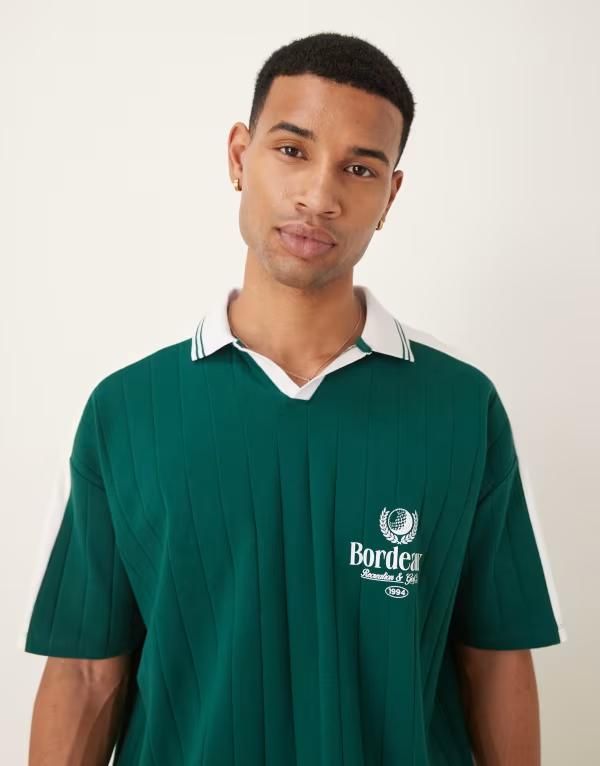 エイソス メンズ トップス ポロシャツ グラフィック ASOS DESIGN oversized polo with sports chest graphic Multi マルチカラー 8,626円