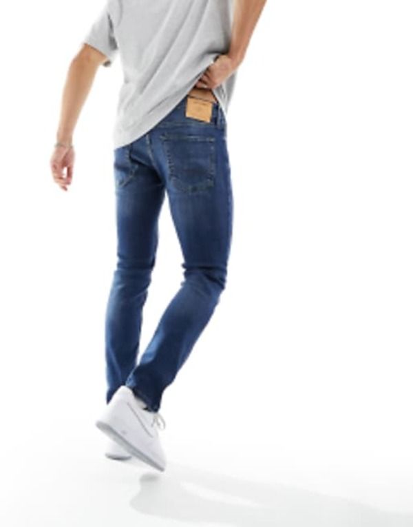 ジャック アンド ジョーンズ メンズ ボトムス デニムパンツ ジーンズ Jack Jones Intelligence Liam skinny fit stretch jeans in mid Blue denim デニム