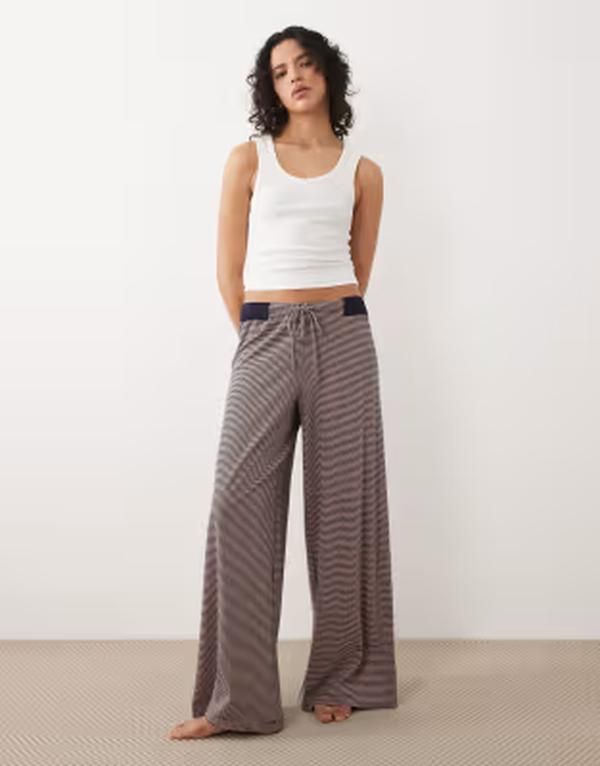 フリーピープル レディース ボトムス カジュアルパンツ ワイドレッグ ローライズ Free People out and about low rise wide leg pants in peach combo Peach combo ピーチ