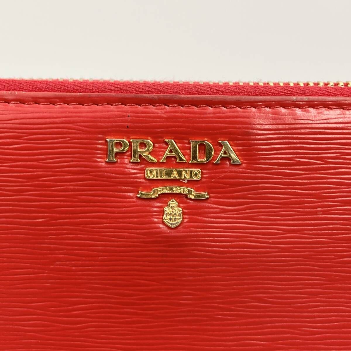 PRADA プラダ ラウンドファスナー 長財布 サフィアーノレザー 赤