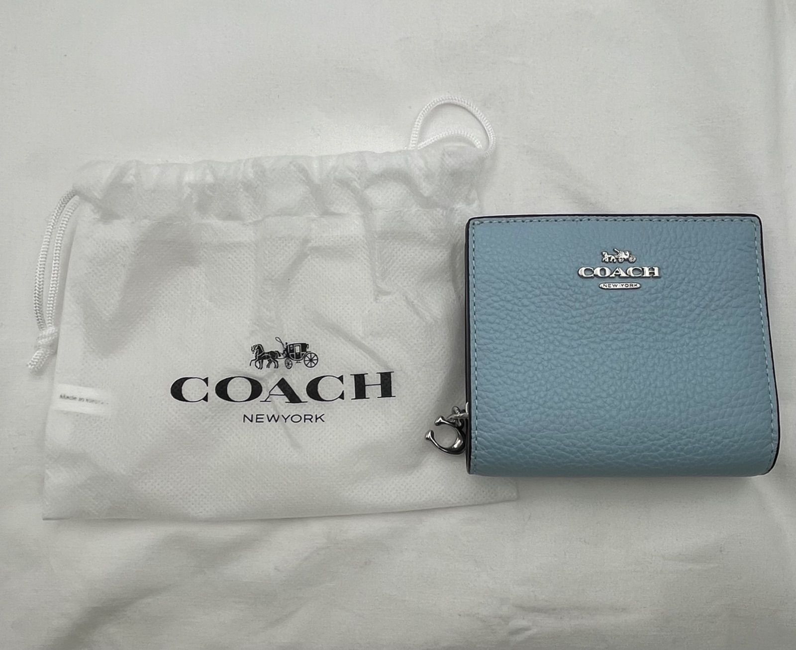 ▽COACH　コーチ　二つ折り財布　水色　C2862SVW3K　外袋付き　11056