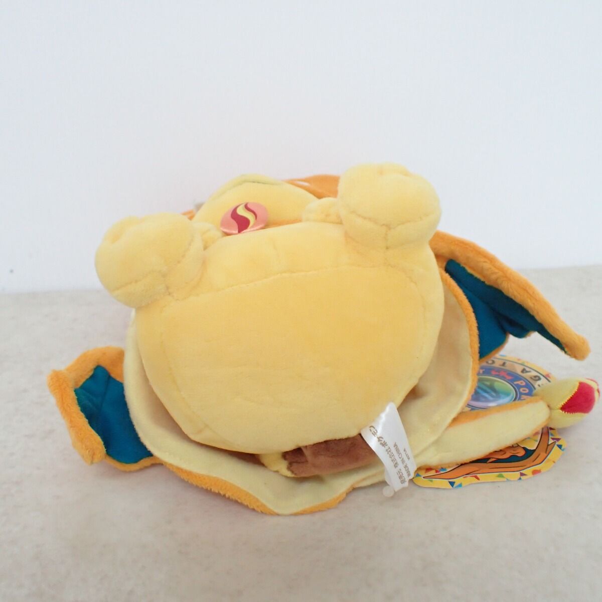 ポケモンセンター ぬいぐるみメガリザードンYのポンチョを着た 