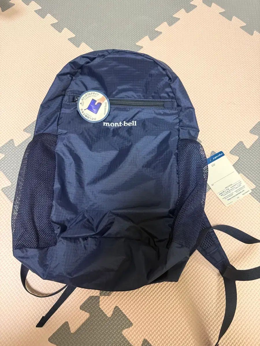 (新品) モンベル ポケッタブル ライト バッグ 10L ネイビー