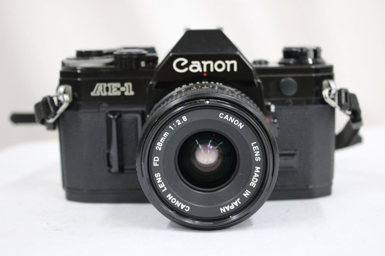 【返品保証】 キャノン Canon AE-1 ブラック NEW FD 28mm F2.8 ボディレンズセット e12377