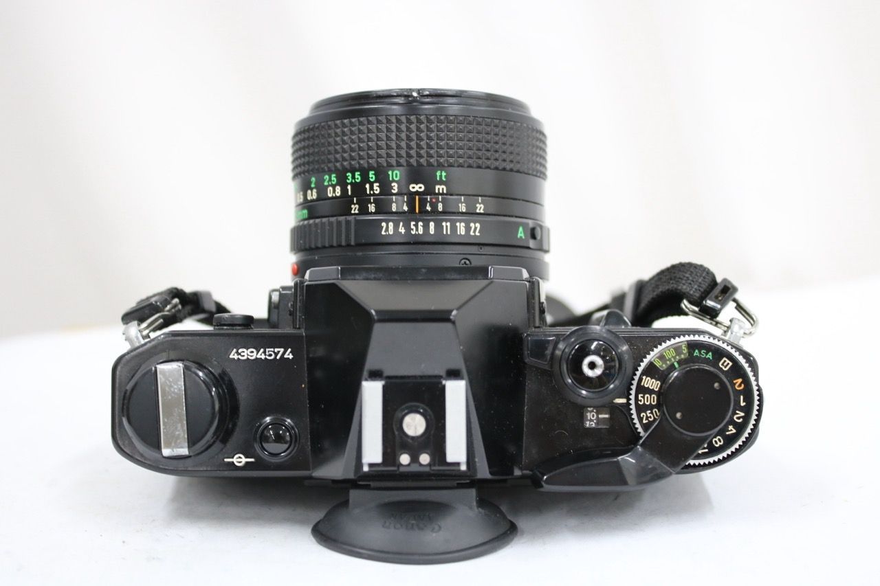 【返品保証】 キャノン Canon AE-1 ブラック NEW FD 28mm F2.8 ボディレンズセット e12377