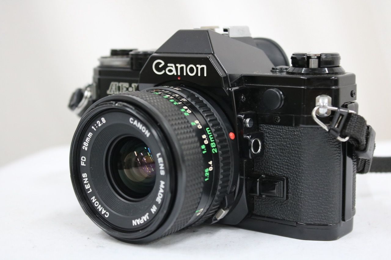 【返品保証】 キャノン Canon AE-1 ブラック NEW FD 28mm F2.8 ボディレンズセット e12377