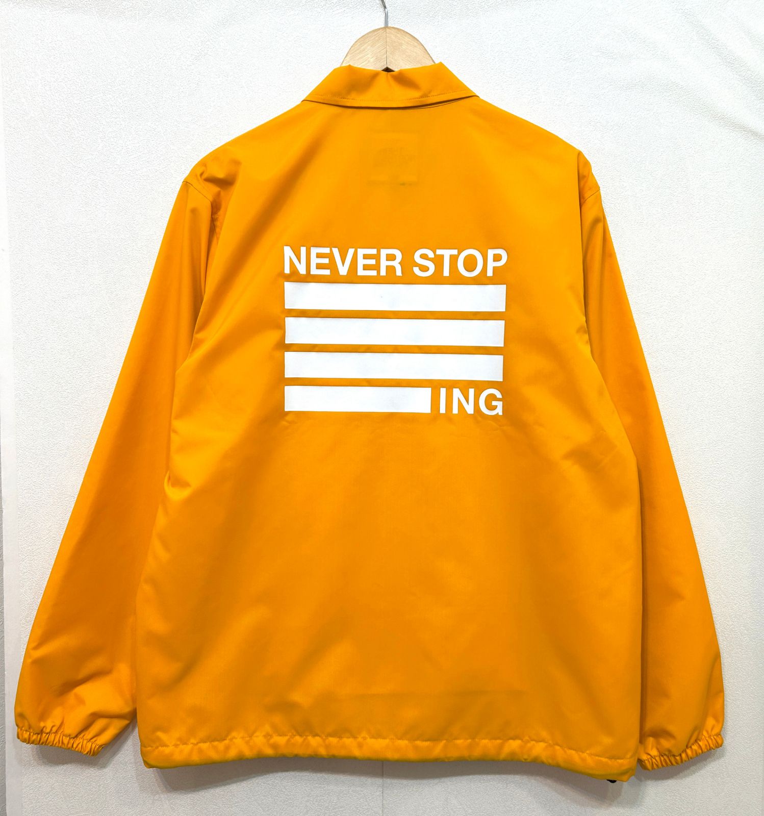 THE NORTH FACE (L) NEVER STOP ING The Coach Jacket ネバーストップ 