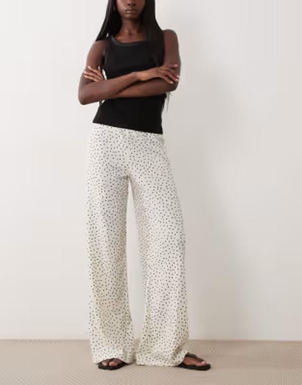 エイソス レディース ボトムス カジュアルパンツ ドット柄 ワイドレッグ ドット プリント ASOS DESIGN textured wide leg pants in large buttermilk polka dot print Yellow polka