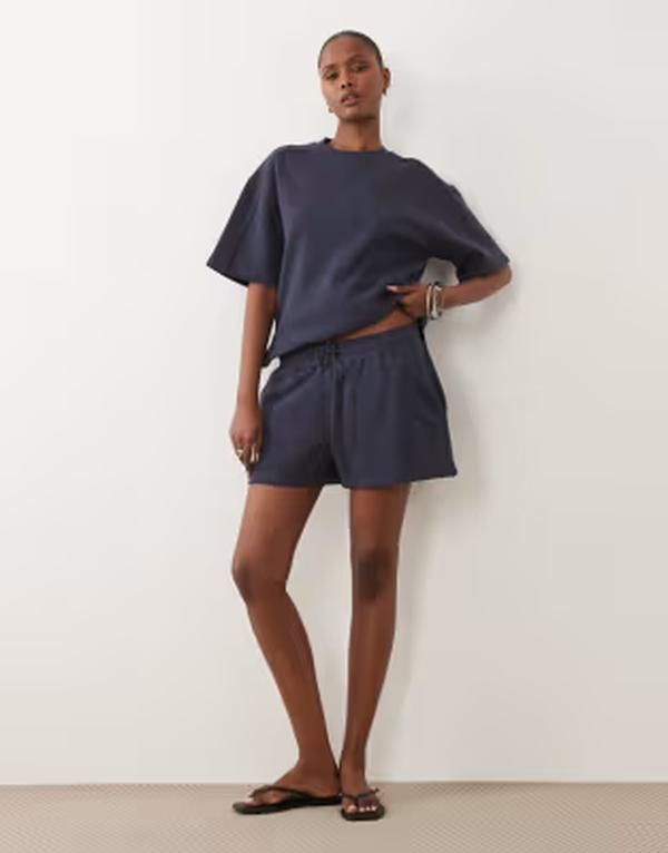 エイソス レディース ボトムス ハーフパンツ・ショーツ ショートパンツ ASOS DESIGN brushback running shorts in dark blue part of a set Dark blue ブルー