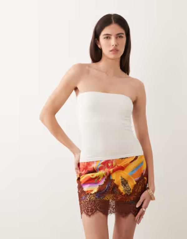 ネバーフリードレスド レディース ボトムスカート レーストリム プリント ミニ レース Never Fully Dressed Rio mini skirt with lace trim in papaya print Multi マルチカラー