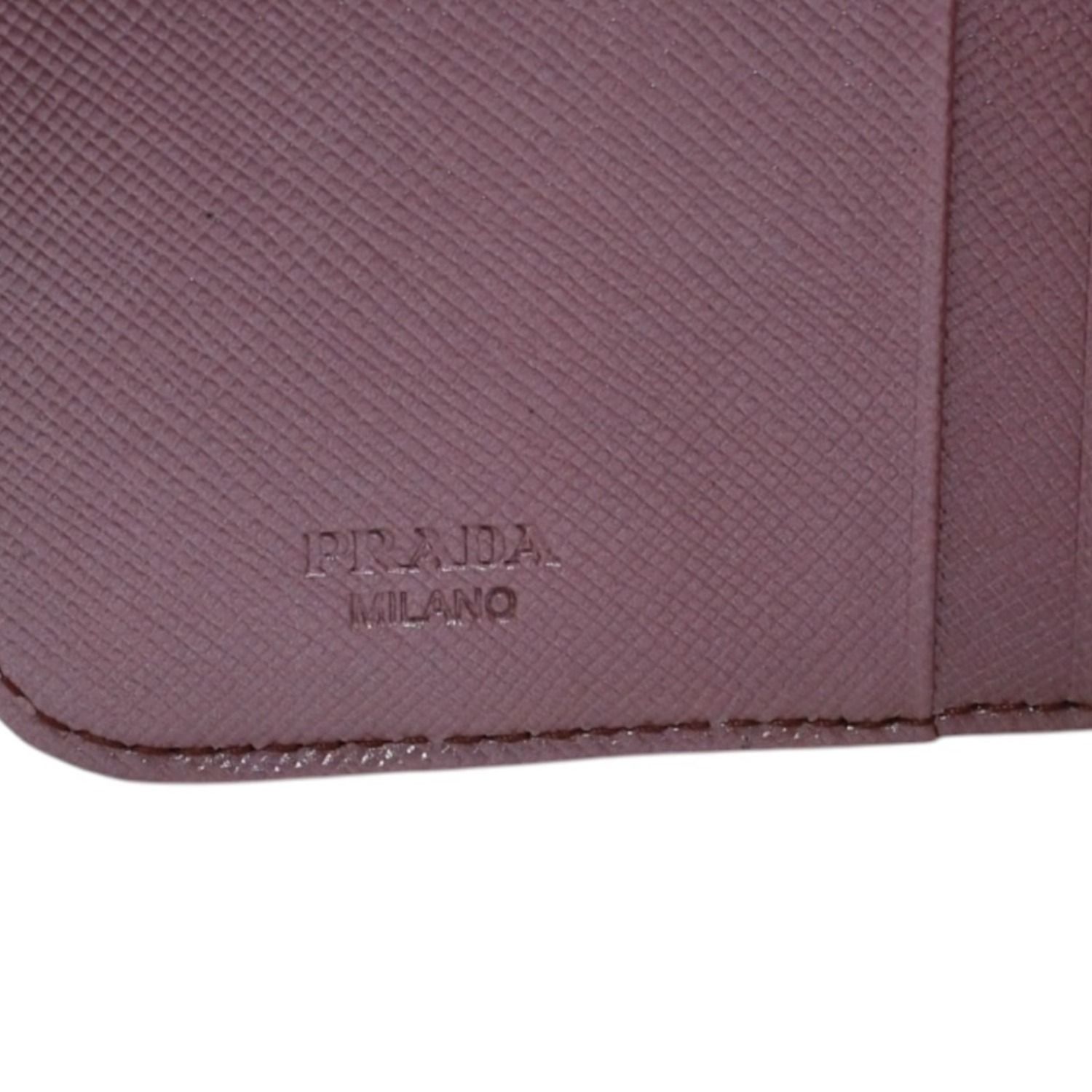 PRADA プラダ 2つ折り財布 コンパクトジップ 財布 ピンク PVC シルバー金具 1M0605R142 美品 中古 4a003019