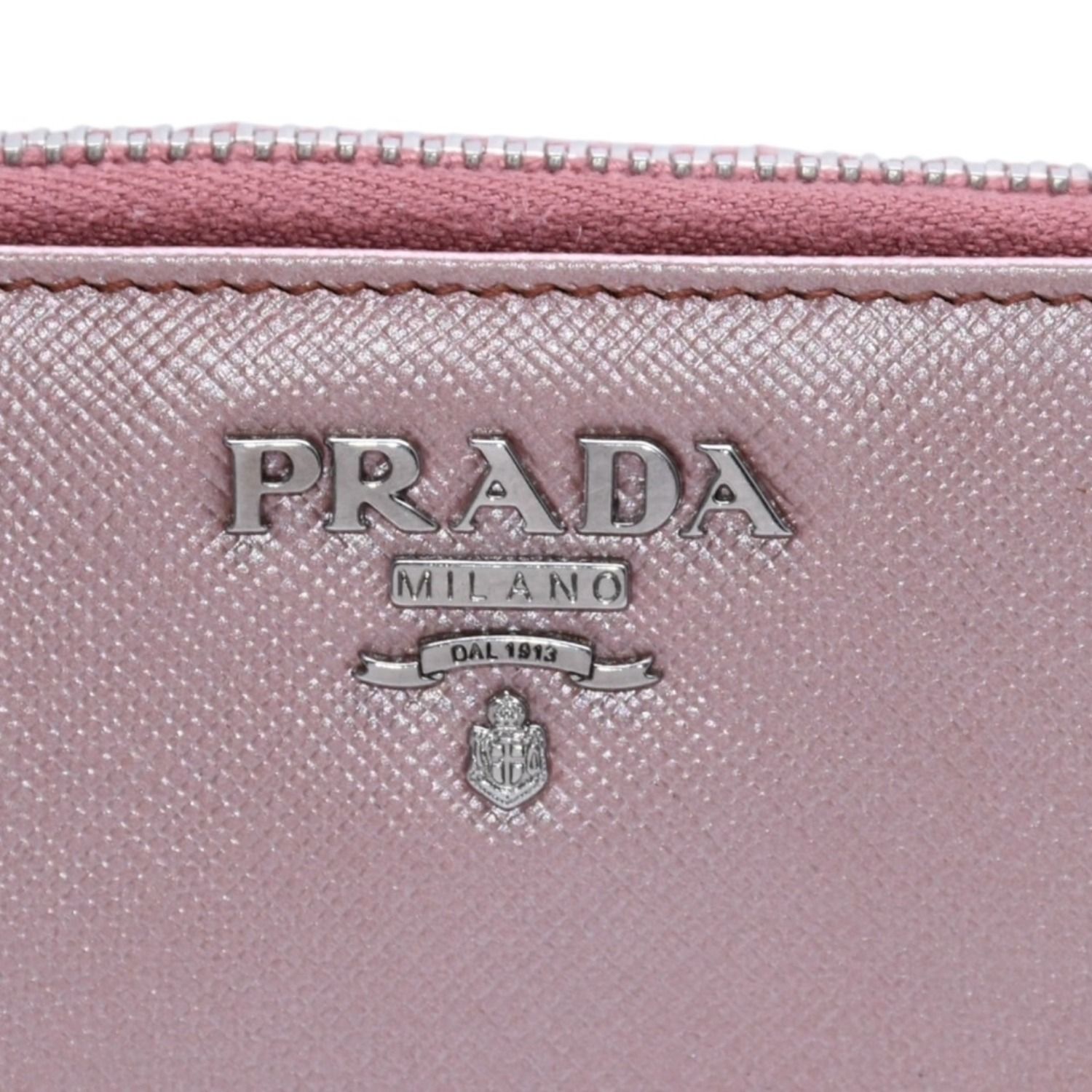 PRADA プラダ 2つ折り財布 コンパクトジップ 財布 ピンク PVC シルバー金具 1M0605R142 美品 中古 4a003019