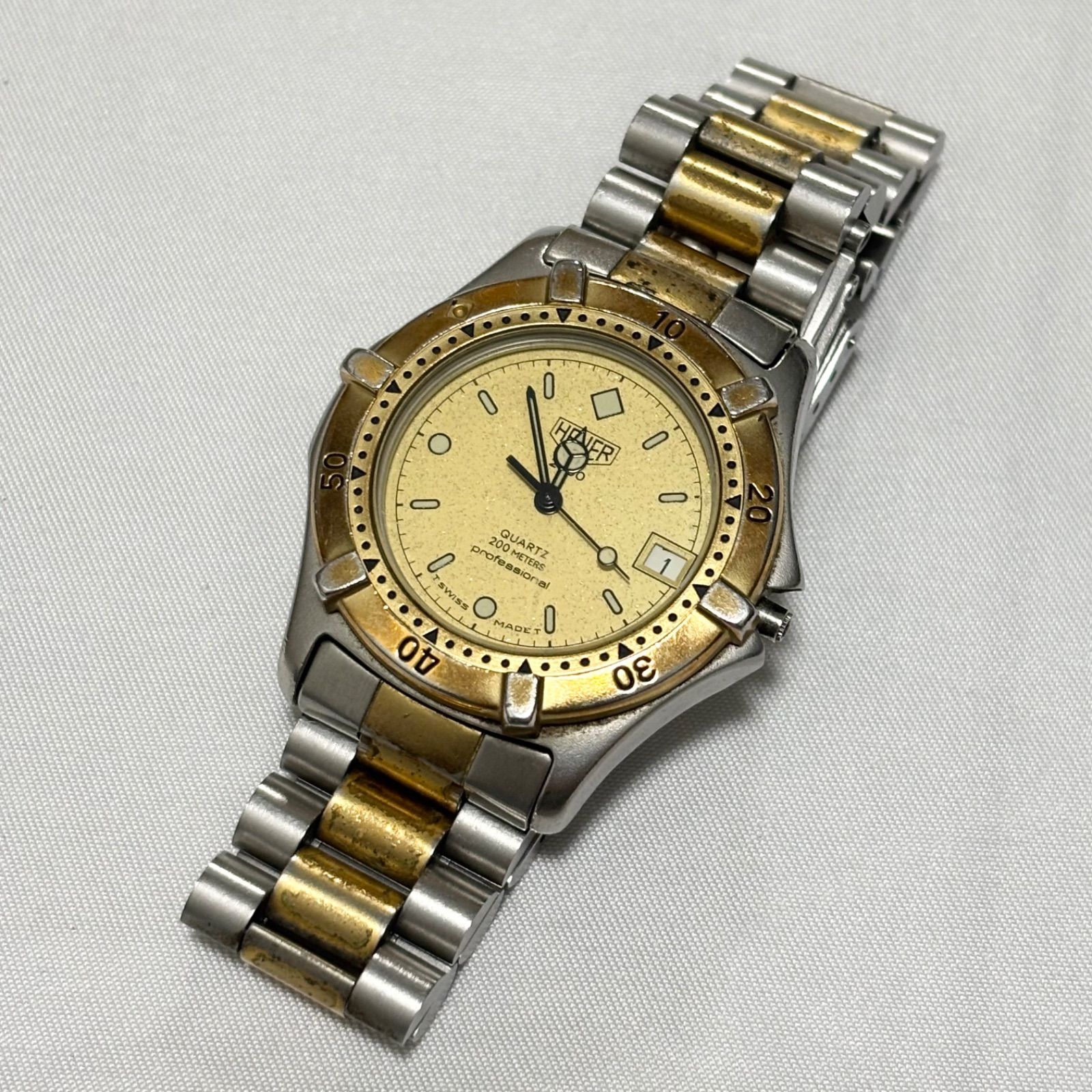 【送料無料】Heuer/ホイヤー/964.013/ゴールド×シルバー/2000シリーズ/クォーツ腕時計/電池切れ/動作未確認/中古品/ジャンク品扱い