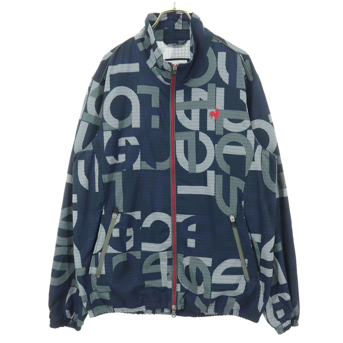 美品 le coq sportif ルコックスポルティフ 総柄 長袖 ナイロンジャケット L ネイビー系 メンズ 古着