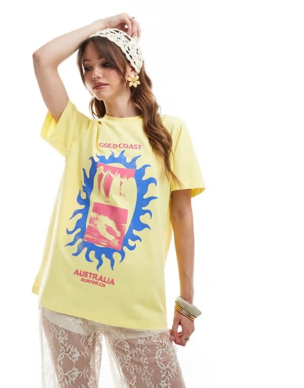 エイソス レディース トップス Tシャツ レギュラーフィット シャツ グラフィック ASOS DESIGN regular fit tshirt with gold coast embroidery graphic in yellowイエロー