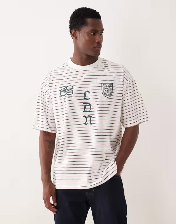 エイソス メンズ トップス Tシャツ グラフィック ASOS DESIGN oversized tshirt with graphics in cream stripes Multi マルチカラー