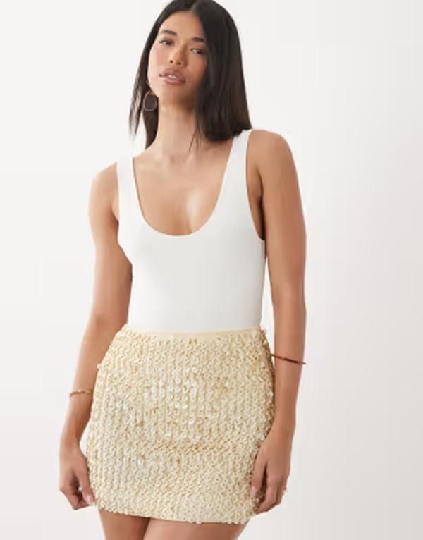 エイソス レディース ボトムスカート A ライン ミニ スパンコール ASOS DESIGN embellished sequin aline mini skirt in cream part of a set Cream クリーム